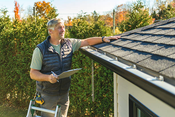 Professional Roofing technician working in Parlier, CA